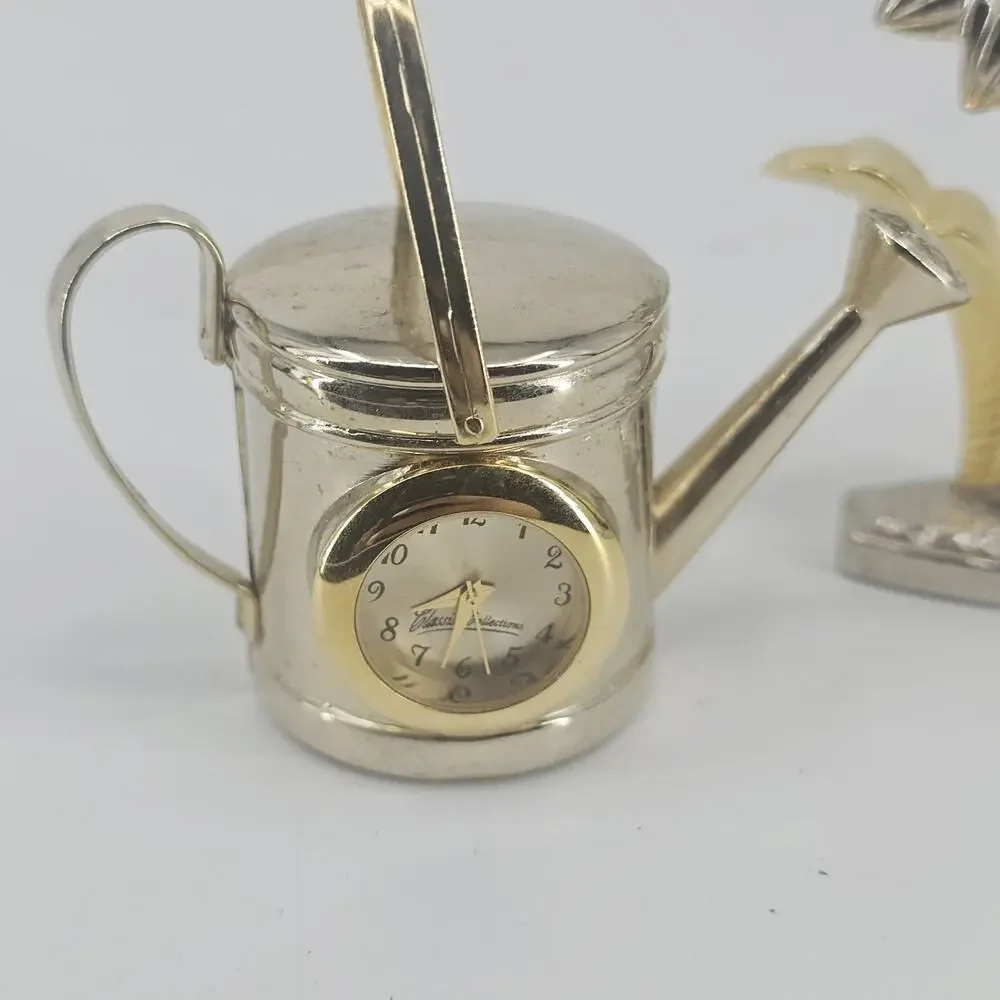 2 SMALL QUARTZ CLOCKS FLOWER & WATER CAN NEED BATTERIES Goldtone Metal Vintage